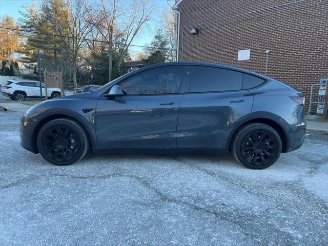 used 2023 Tesla Model Y car, priced at $32,705