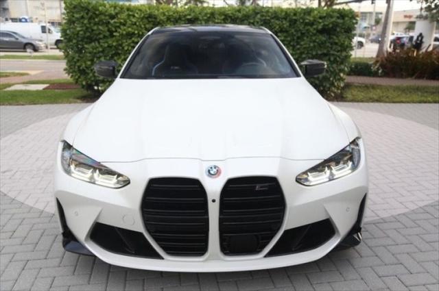 used 2022 BMW M4 car, priced at $86,570