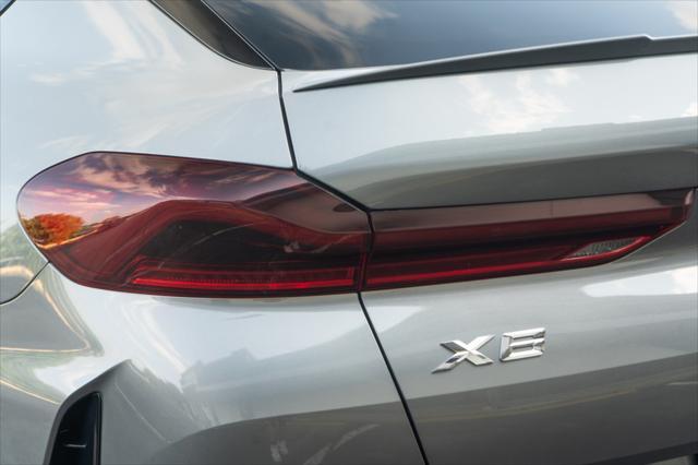 used 2025 BMW X6 car, priced at $61,105