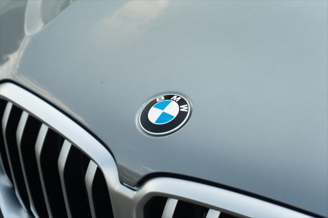 used 2025 BMW X6 car, priced at $61,105