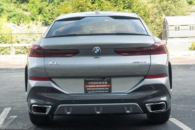 used 2025 BMW X6 car, priced at $61,105