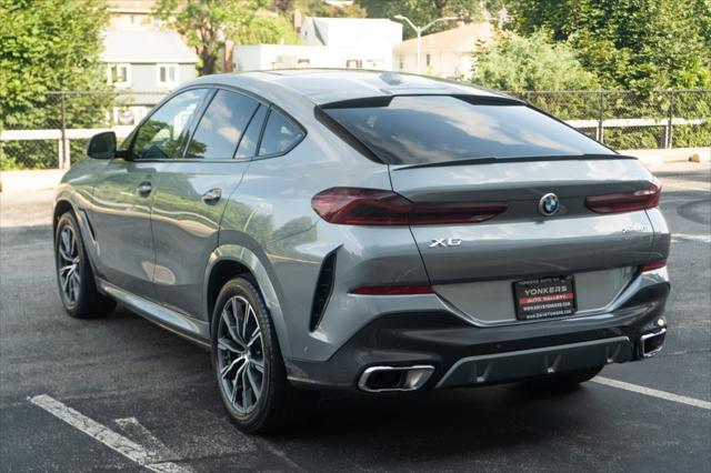 used 2025 BMW X6 car, priced at $61,105