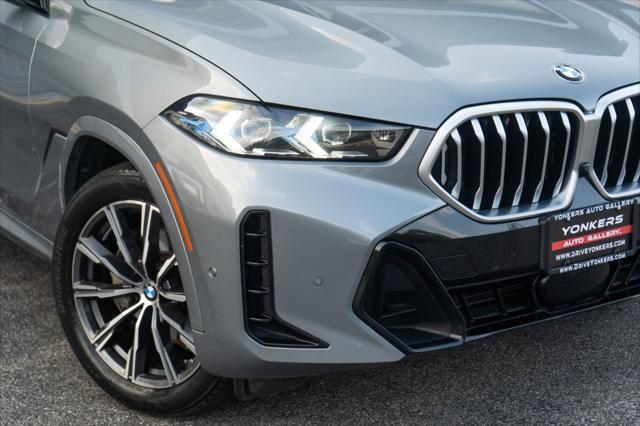 used 2025 BMW X6 car, priced at $61,105