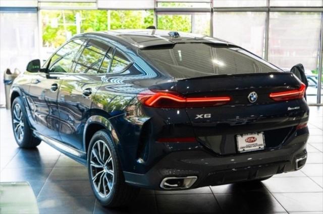 used 2024 BMW X6 car, priced at $62,921