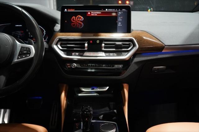 used 2023 BMW X4 car, priced at $46,838