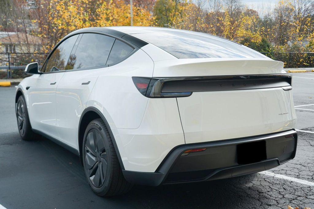 used 2026 Tesla Model Y car, priced at $54,150