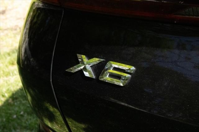 used 2022 BMW X6 car, priced at $49,922