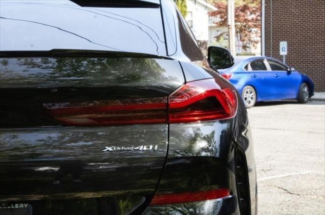 used 2022 BMW X6 car, priced at $49,922