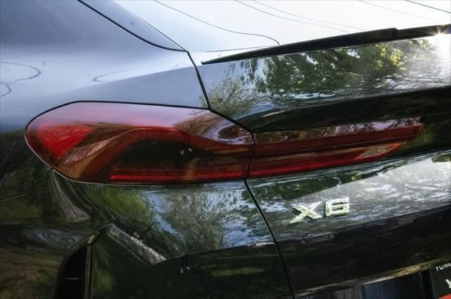 used 2022 BMW X6 car, priced at $49,922
