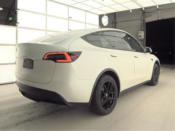 used 2023 Tesla Model Y car, priced at $27,050