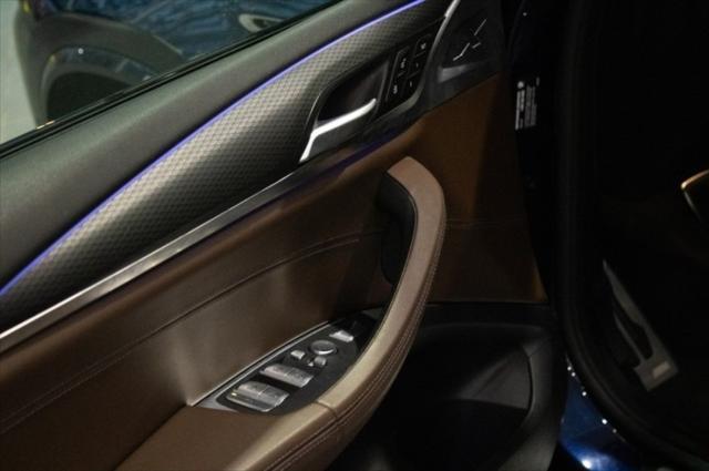 used 2022 BMW X4 car, priced at $34,135