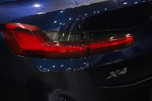 used 2022 BMW X4 car, priced at $34,135