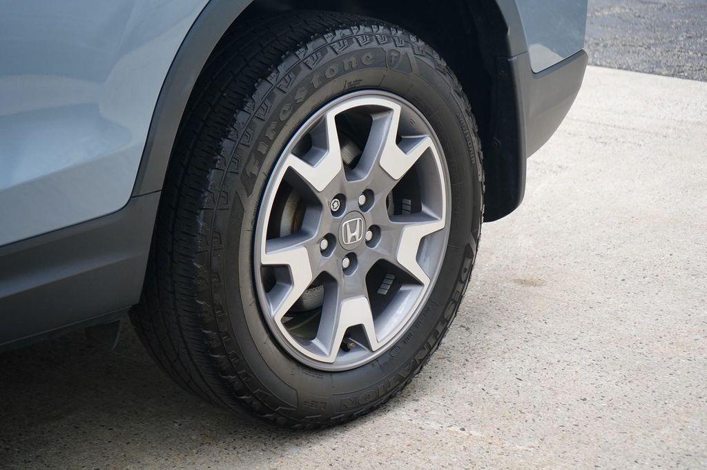 used 2023 Honda Passport car, priced at $30,250