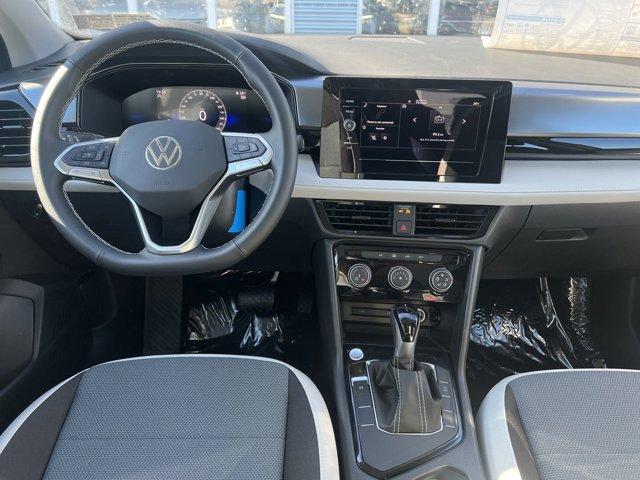 new 2025 Volkswagen Taos car, priced at $27,011