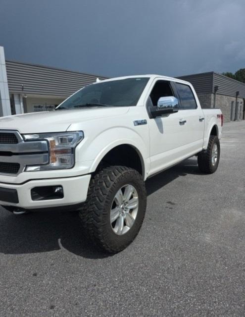 used 2018 Ford F-150 car, priced at $38,052