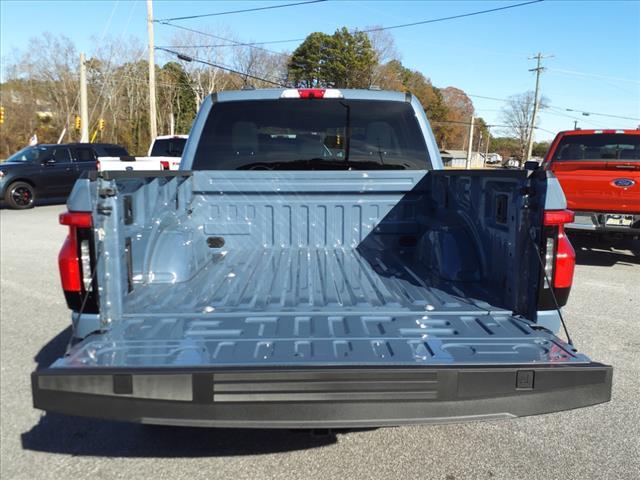 new 2023 Ford F-150 Lightning car, priced at $54,700