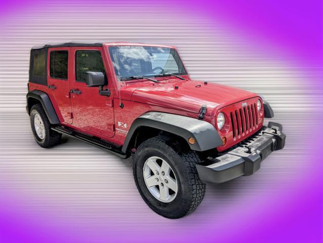 used 2009 Jeep Wrangler Unlimited car, priced at $11,900
