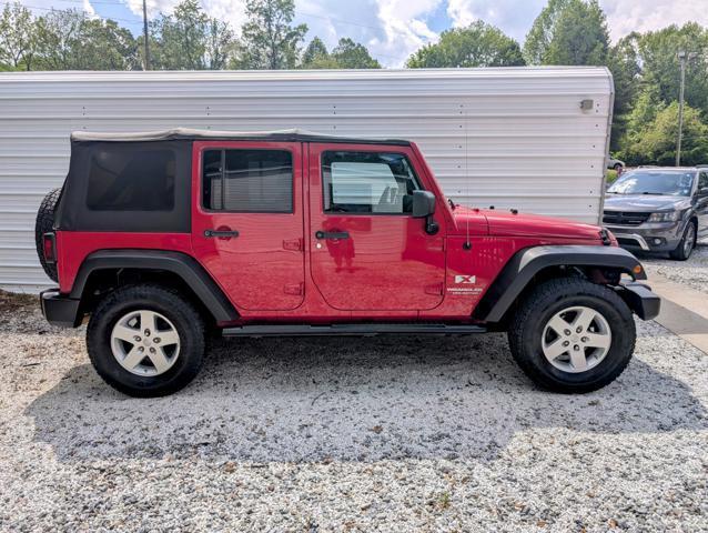 used 2009 Jeep Wrangler Unlimited car, priced at $11,900