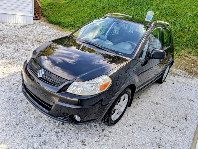 used 2009 Suzuki SX4 car, priced at $7,900