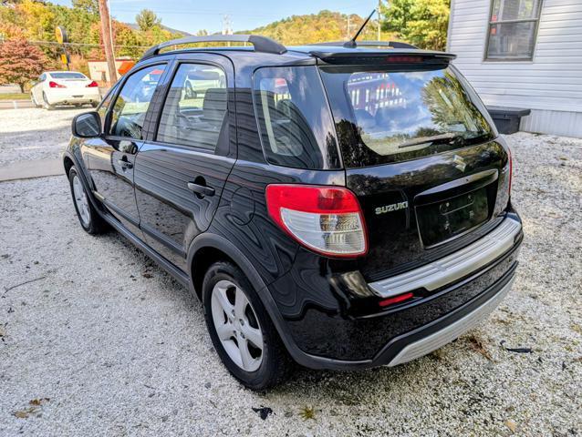 used 2009 Suzuki SX4 car, priced at $7,900