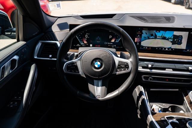 used 2024 BMW X6 car, priced at $65,973