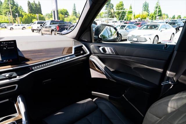 used 2024 BMW X6 car, priced at $65,973