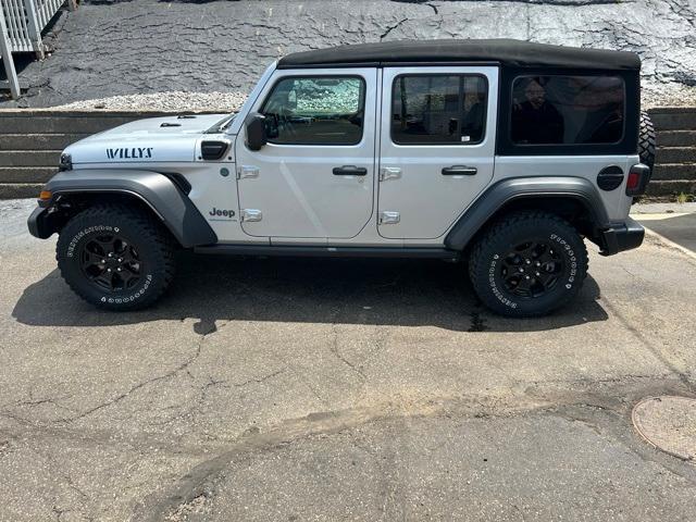 used 2023 Jeep Wrangler 4xe car, priced at $33,888