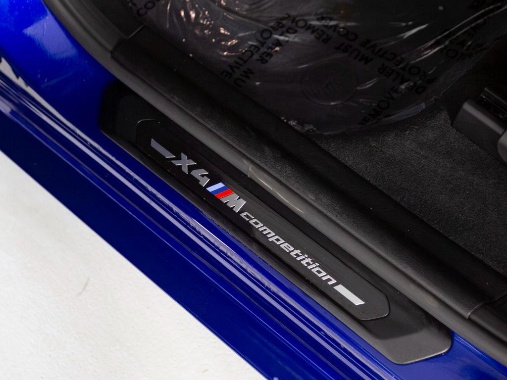 used 2024 BMW X4 M car, priced at $71,490