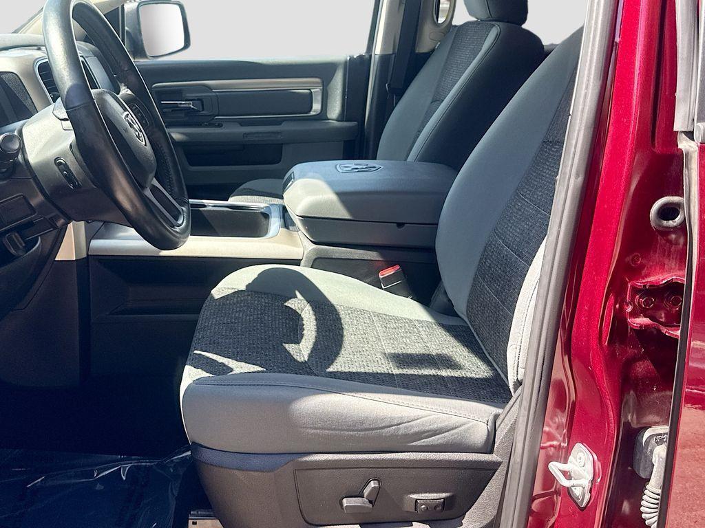 used 2018 Ram 1500 car, priced at $27,000