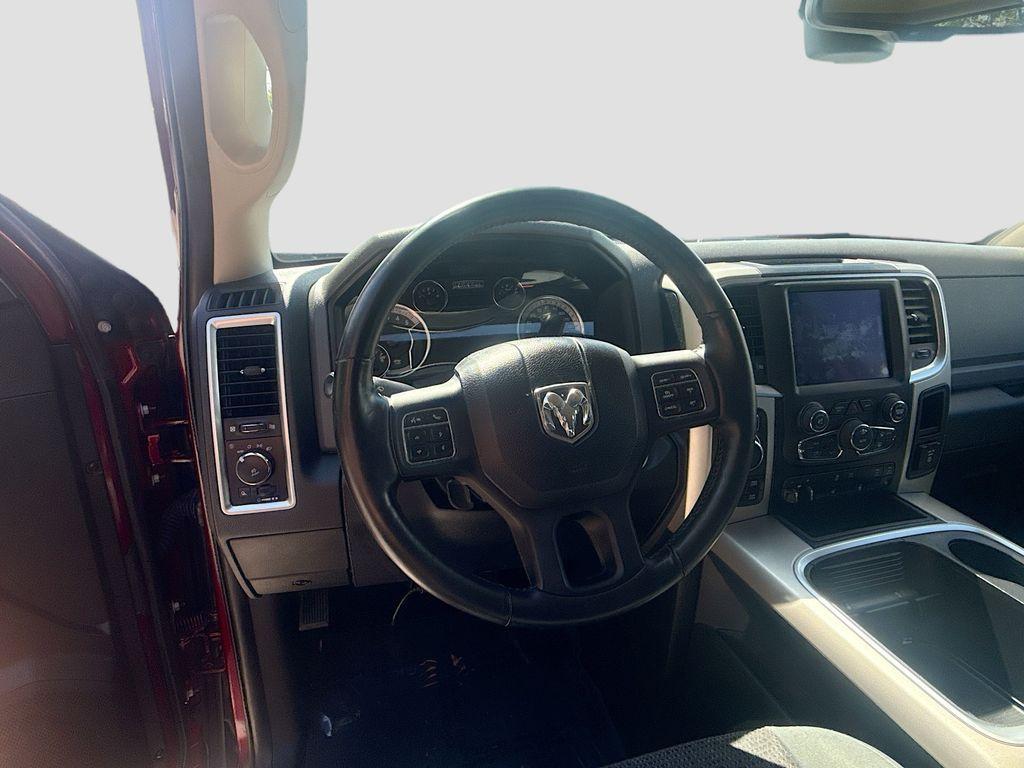 used 2018 Ram 1500 car, priced at $27,000