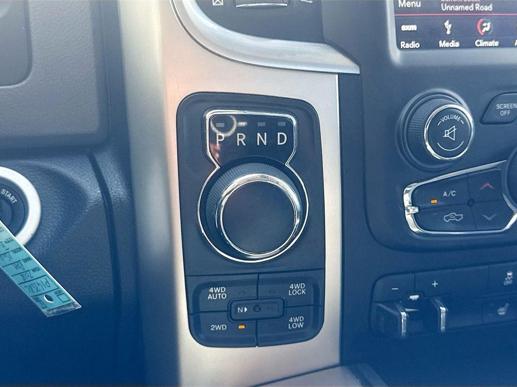 used 2018 Ram 1500 car, priced at $27,000