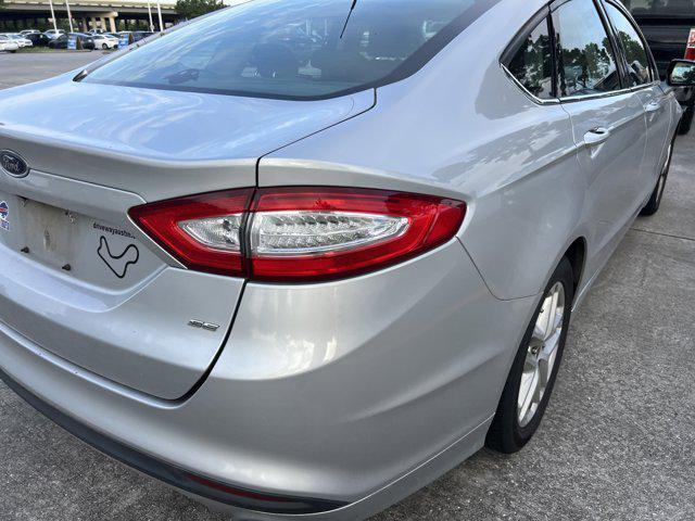 used 2016 Ford Fusion car, priced at $8,999