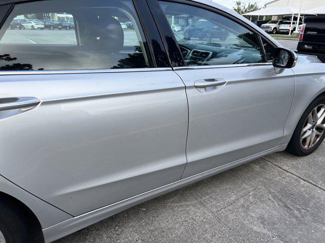 used 2016 Ford Fusion car, priced at $8,999