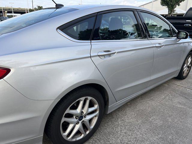used 2016 Ford Fusion car, priced at $8,999
