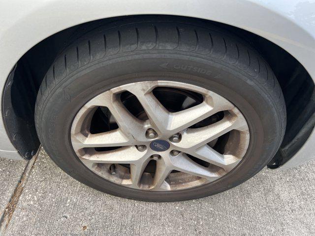 used 2016 Ford Fusion car, priced at $8,999