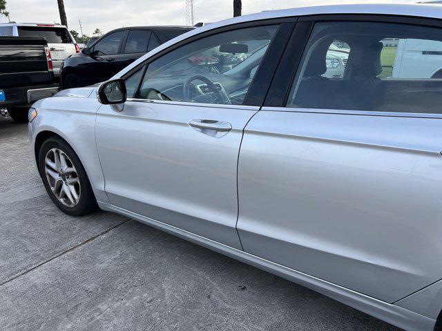 used 2016 Ford Fusion car, priced at $8,999
