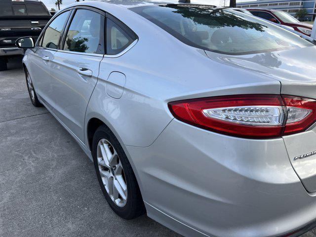 used 2016 Ford Fusion car, priced at $8,999