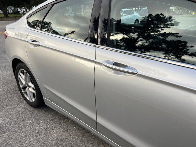 used 2016 Ford Fusion car, priced at $8,999