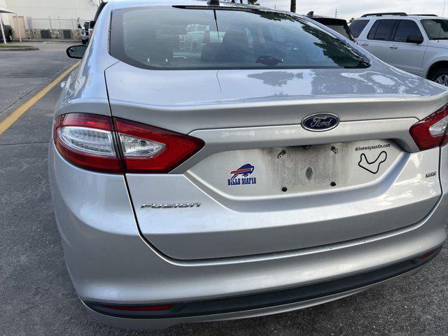 used 2016 Ford Fusion car, priced at $8,999