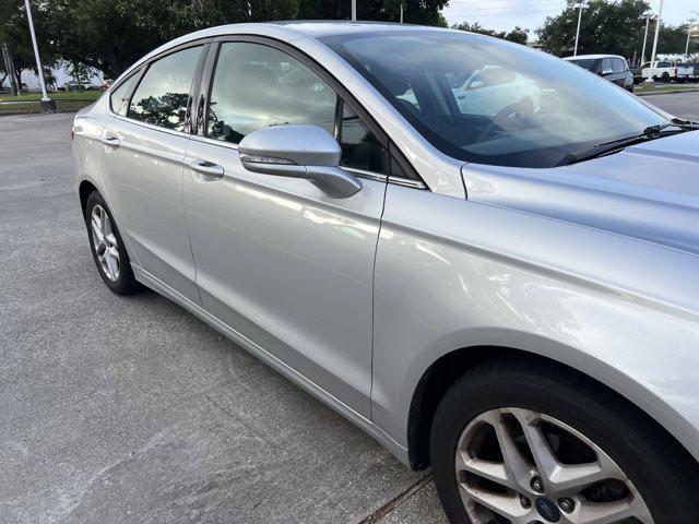used 2016 Ford Fusion car, priced at $8,999