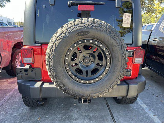 used 2016 Jeep Wrangler Unlimited car, priced at $28,246