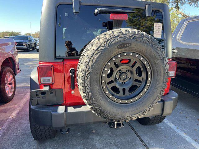 used 2016 Jeep Wrangler Unlimited car, priced at $28,246