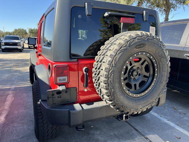 used 2016 Jeep Wrangler Unlimited car, priced at $28,246