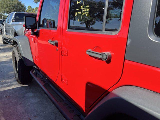 used 2016 Jeep Wrangler Unlimited car, priced at $28,246