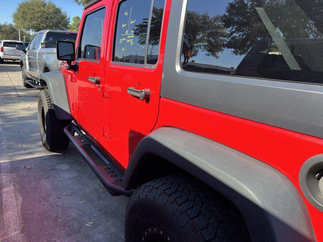 used 2016 Jeep Wrangler Unlimited car, priced at $28,246