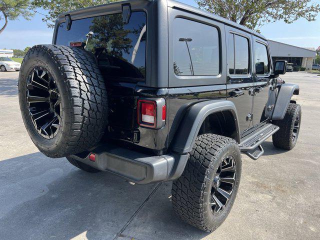 used 2021 Jeep Wrangler Unlimited car, priced at $37,496