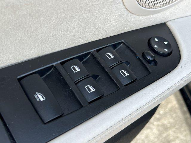 used 2011 BMW Z4 car, priced at $11,999