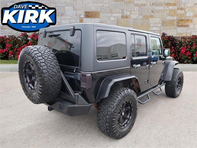 used 2011 Jeep Wrangler Unlimited car, priced at $15,290