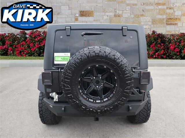 used 2011 Jeep Wrangler Unlimited car, priced at $15,290