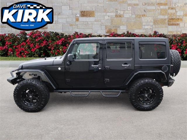 used 2011 Jeep Wrangler Unlimited car, priced at $15,290